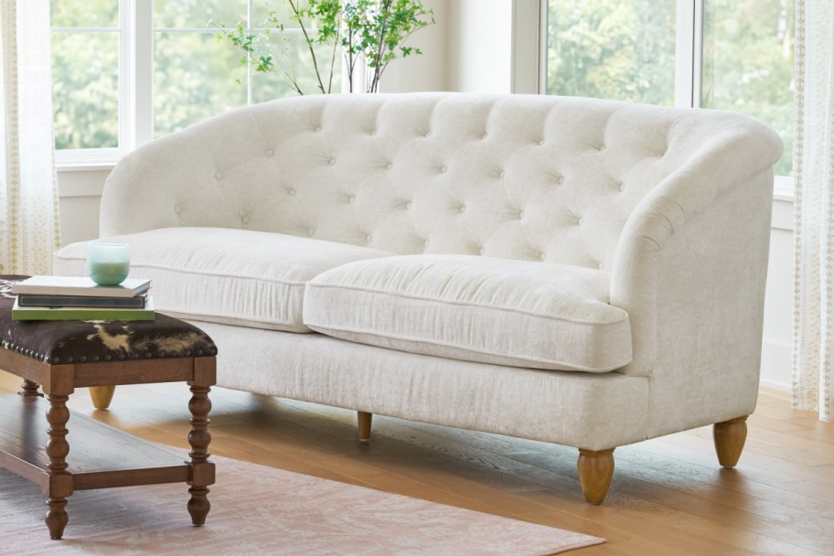 white tufted sofa