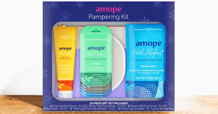 exfoliating feet gift set on a wood table