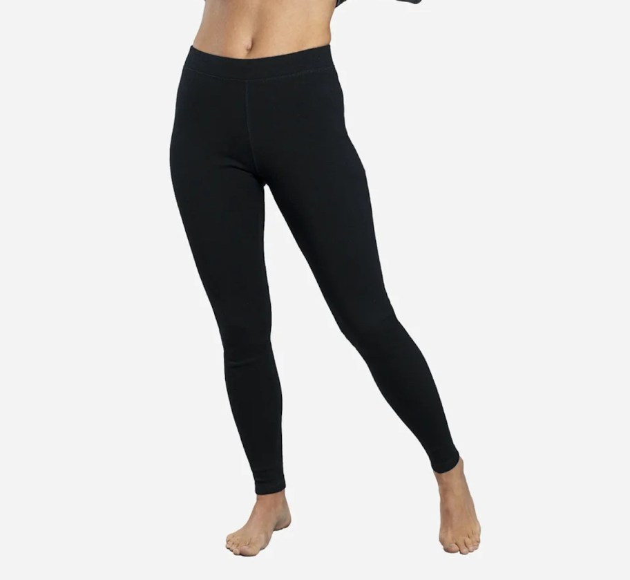 stock photo of woman wearing black wool leggings