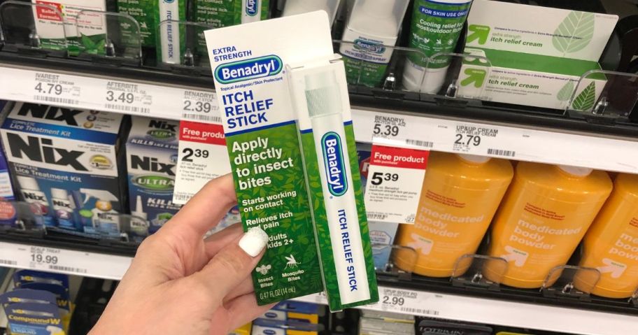 Hand Holding a Benedryl Itch Stick