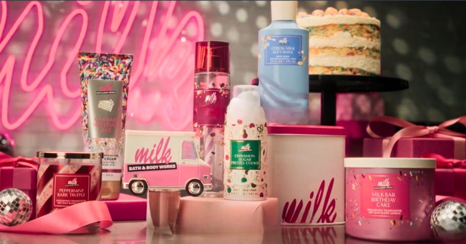 Milk Bar Bath & Body Works candles and body care items on a counter