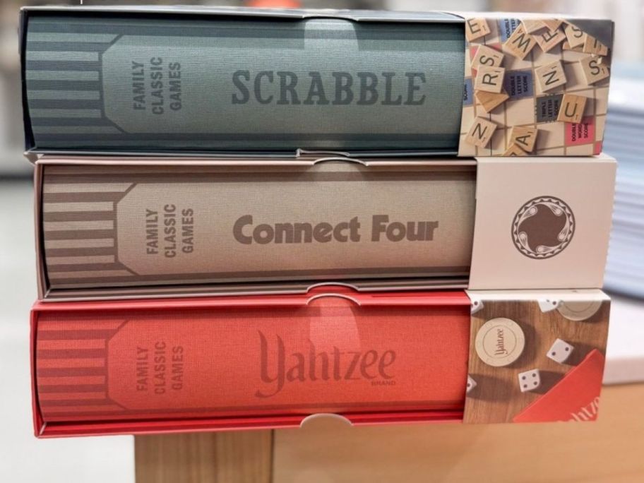 3 board games that look like books: Scrabble, Connect Four, Yahtzee