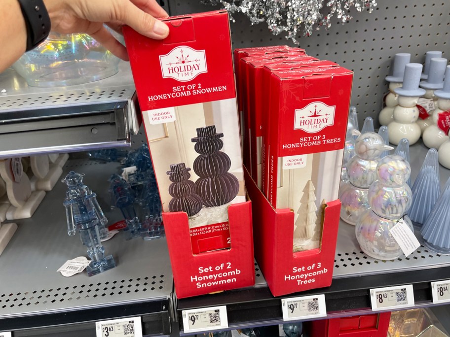 boxes of honeycomb paper snowmen and christmas trees