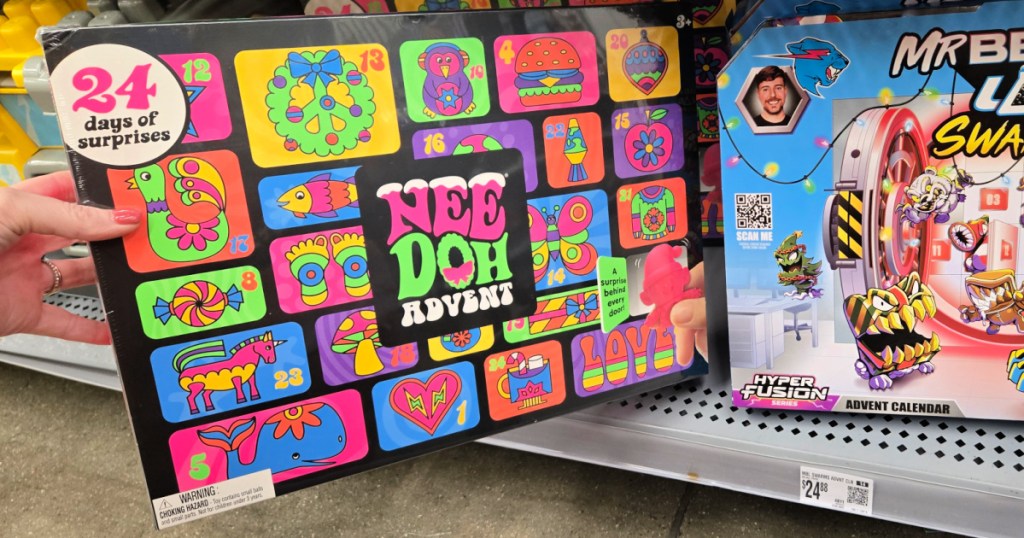 Women grabbing Nedo advent calendar from shelf