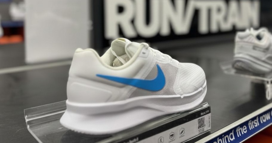 Nike running shoes on display in a store