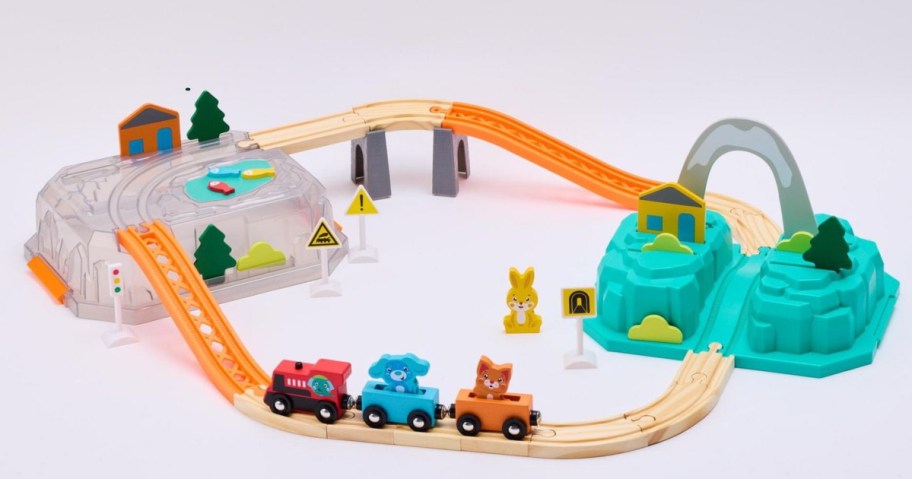 wooden train set with colorful animal figures and train cars