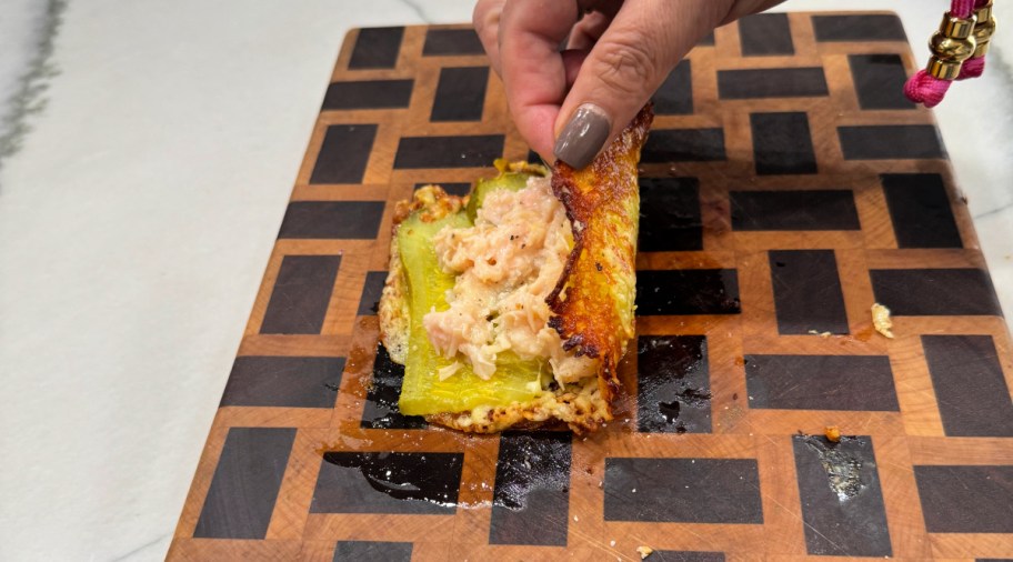 folding a cheese and pickle sandwich 