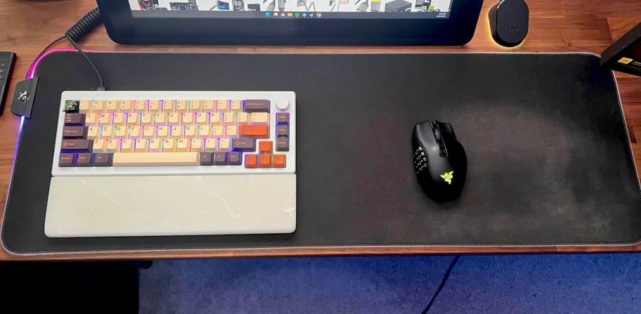 black gaming mouse pad with white keyboard and black mouse