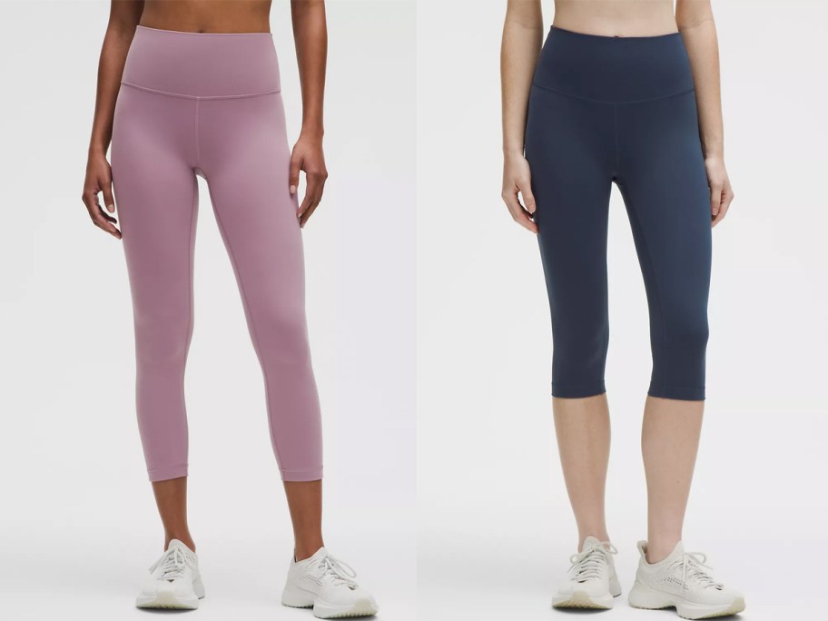 two women in purple leggings and navy blue capris