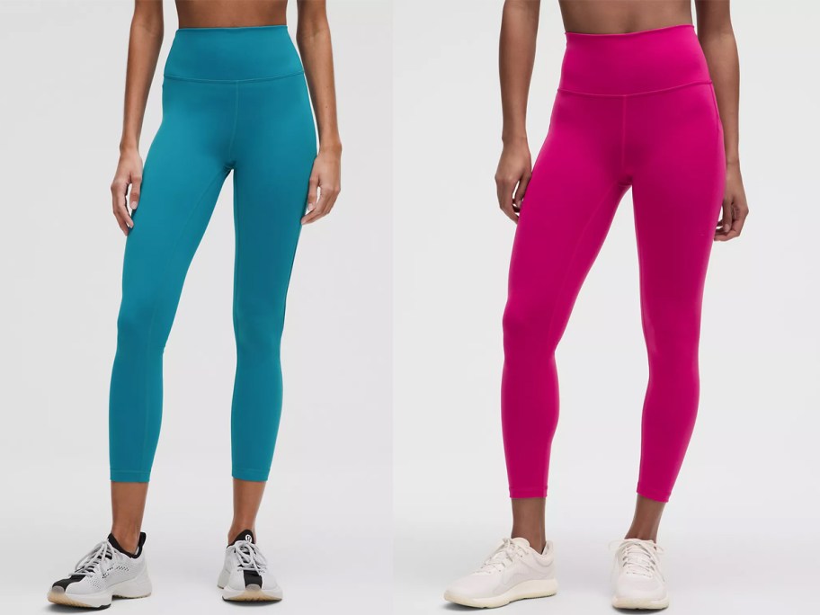 two women in blue and dark pink leggings