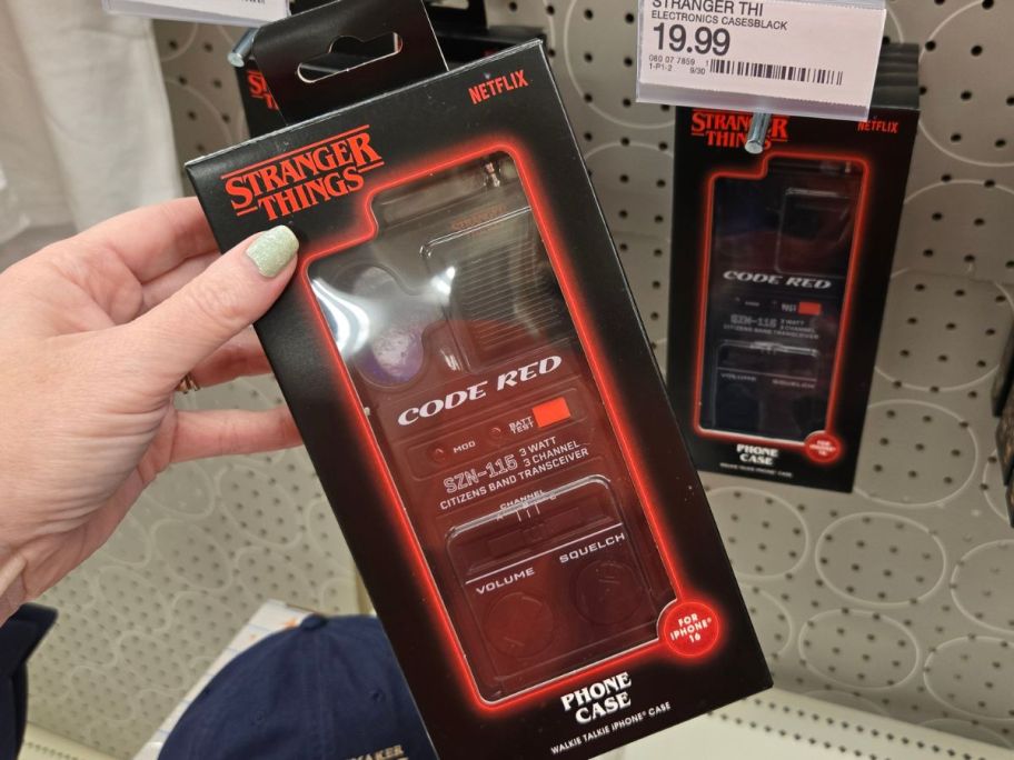 Stranger Things Walkie Talkie iPhone 15 Pro Max Phone Case in hand in store