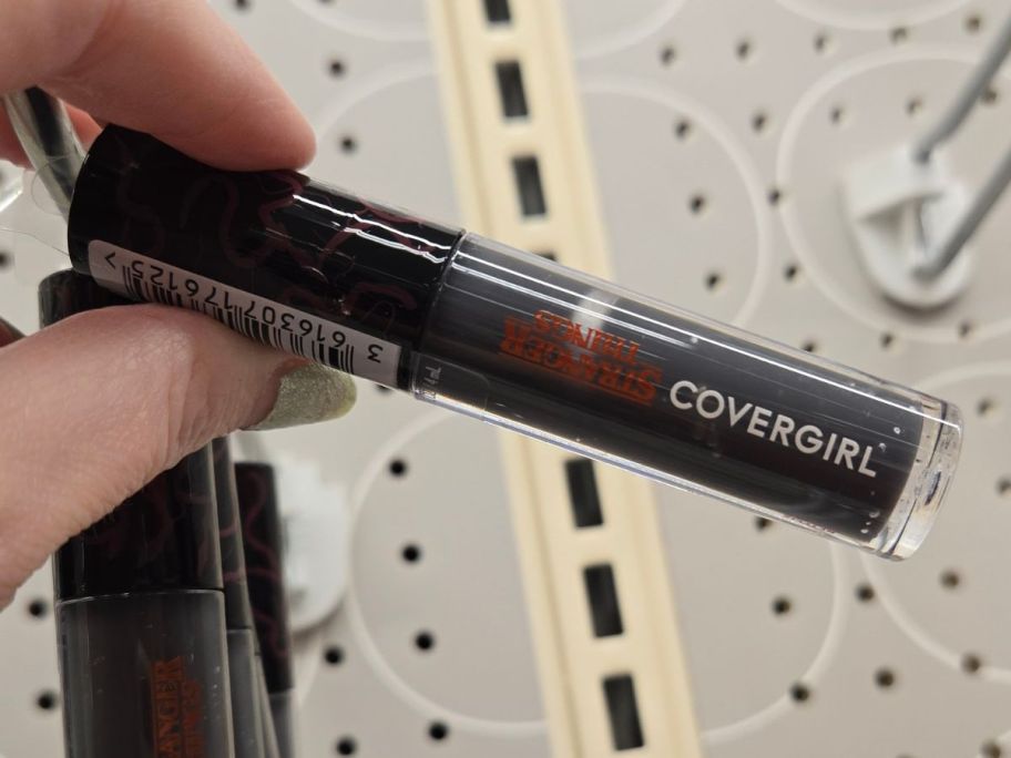 COVERGIRL x STRANGER THINGS The Bite PH Transforming Lip Gloss in hand in store