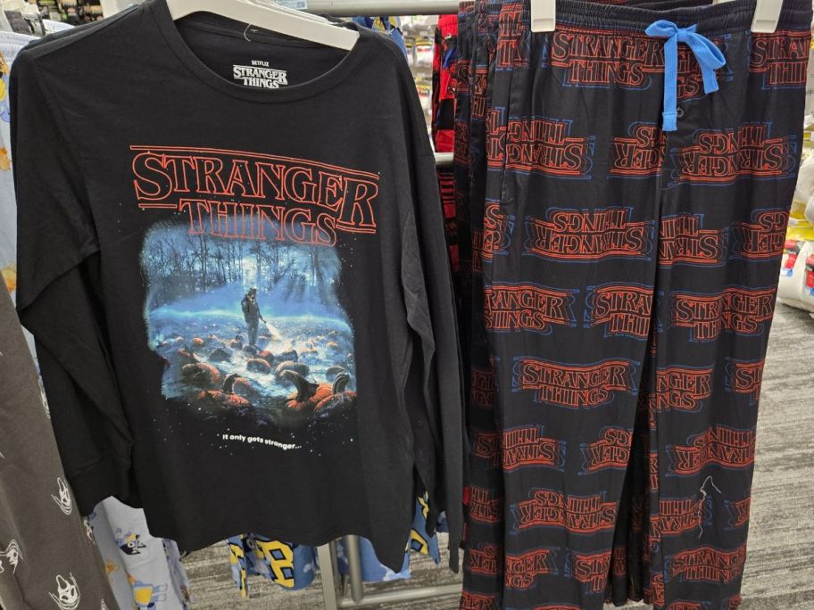 stranger things top and pajama pants hanging in store