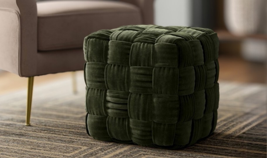 a green velvet braided poof