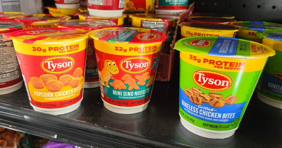 3 Tyson Chicken Cups on a refrigerated grocery shelf