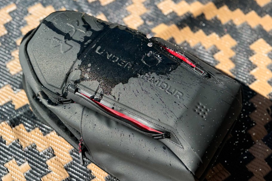 water spilling on backpack