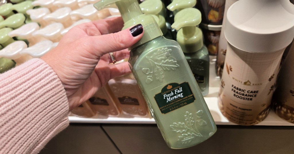 person holding Bath Body Works Fall Scent Soap