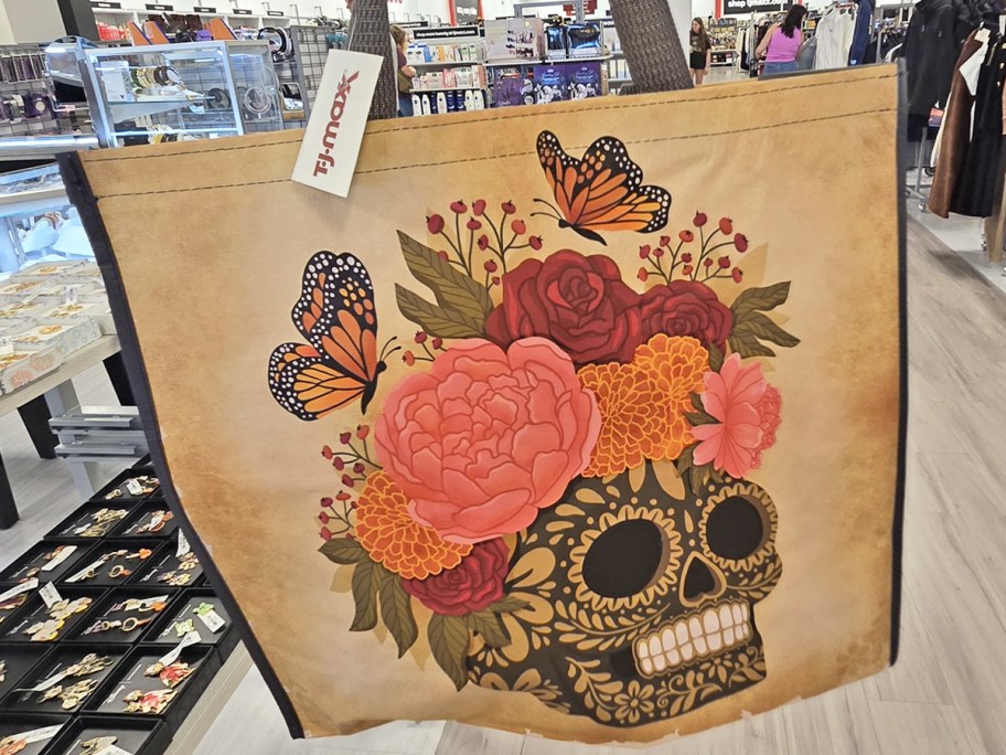 reusable shopping tote with a skull with flowers and butterflies