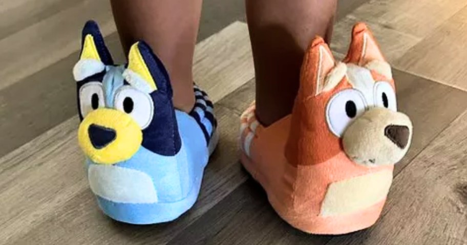 kids feet wearing Bluey and Bingo slippers