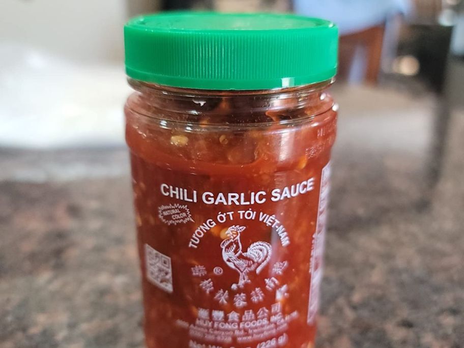 Huy Fong Chili Garlic Sauce 8oz jar on counter