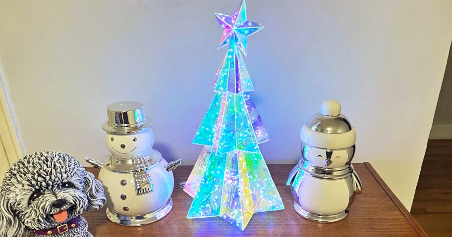 christmas decor on a wooden sideboard cabinet