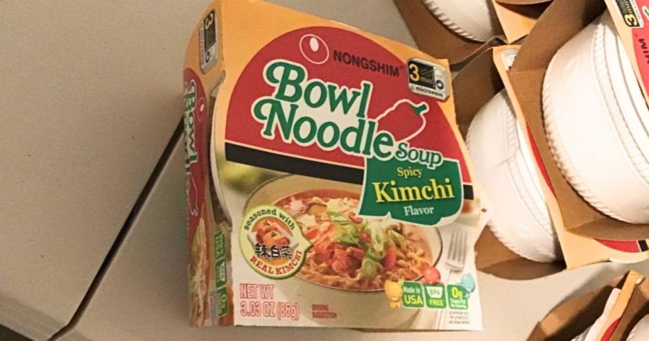Nongshim Ramen Noodles 3.03oz bowl in spicy kimchi on table