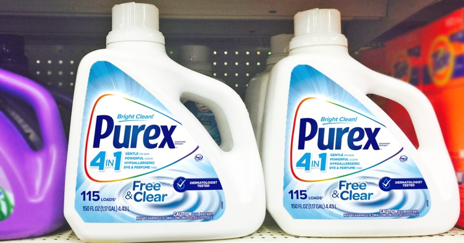 large white bottles of Purex Free & Clear Laundry Detergent on store shelf