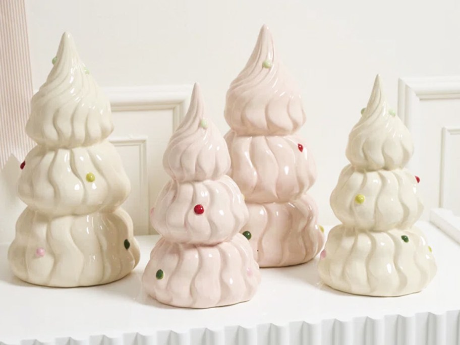 white and pink ceramic trees on a white table