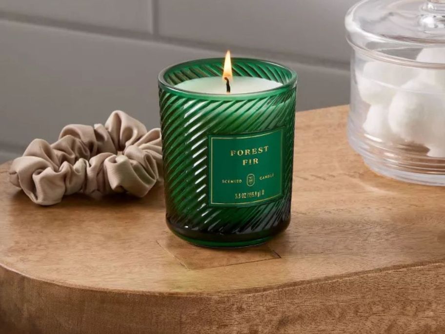 green Threshold Swirled Glass 5oz Jar Candle on table