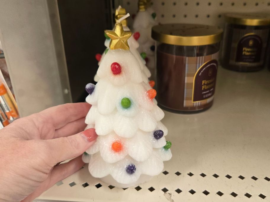 Threshold Christmas Tree Candle on shelf in store