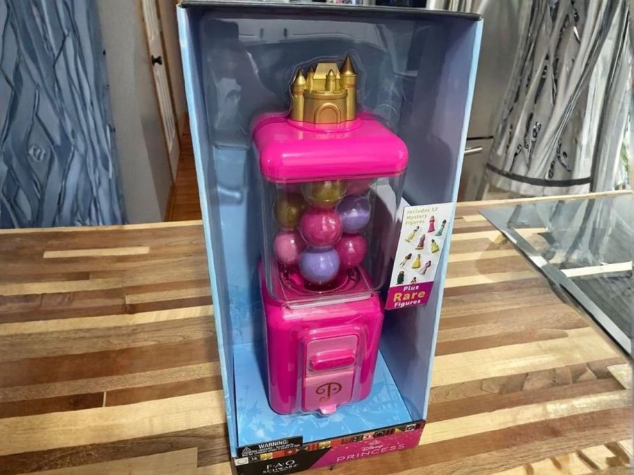 princess FAO Schwarz Toy Vending Machine on table