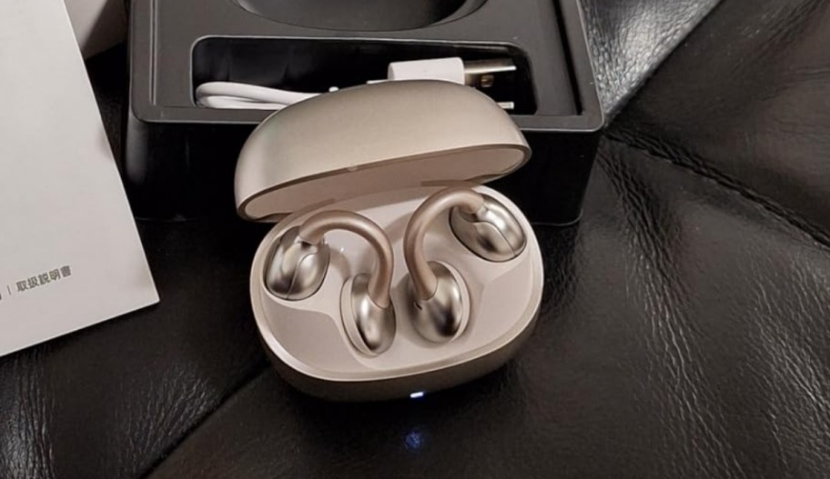 a pair of joyroom earbuds