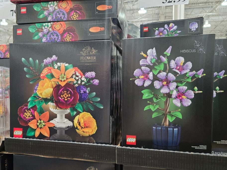 lego flower set boxes on shelf in store