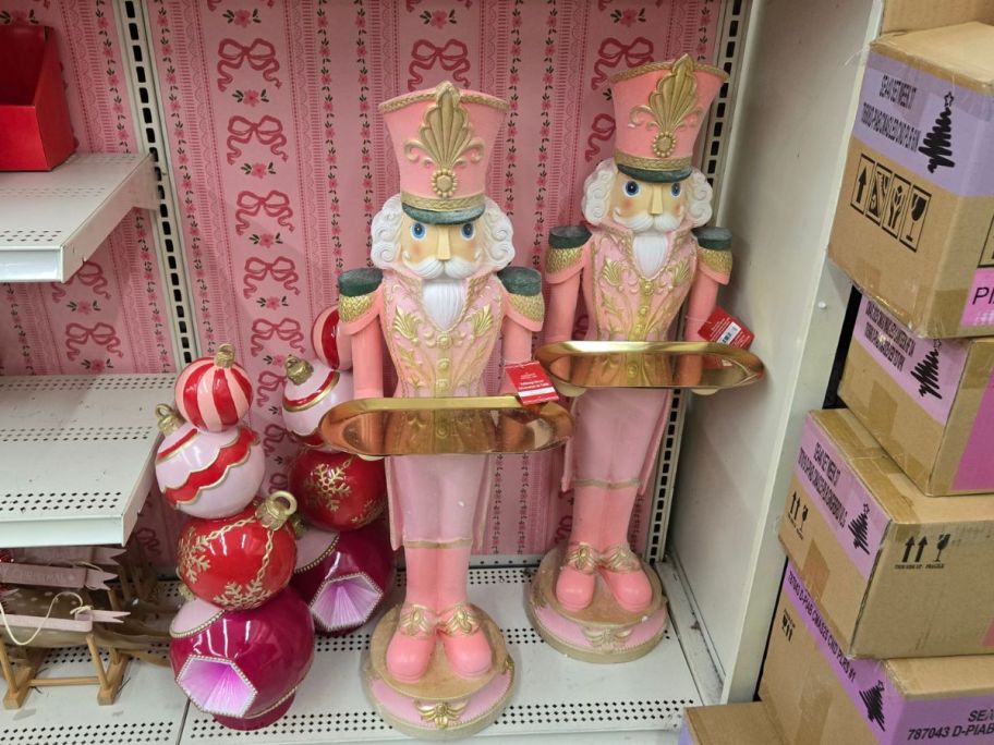 Pink Nutcracker w/ Tray Tabletop D&eacute;cor on shelf in store