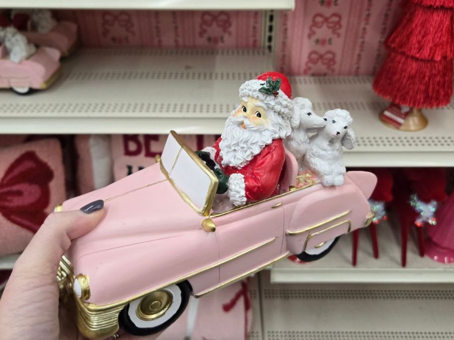Santa & Poodles in Pink Car Tabletop D&eacute;cor in hand in store