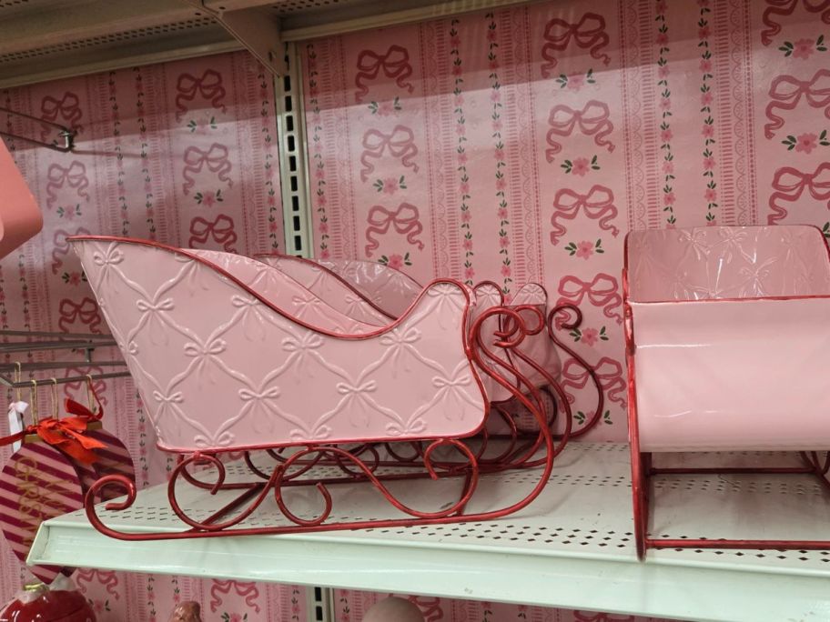 Pink Bows Sleigh Tabletop D&eacute;cor on shelf in store