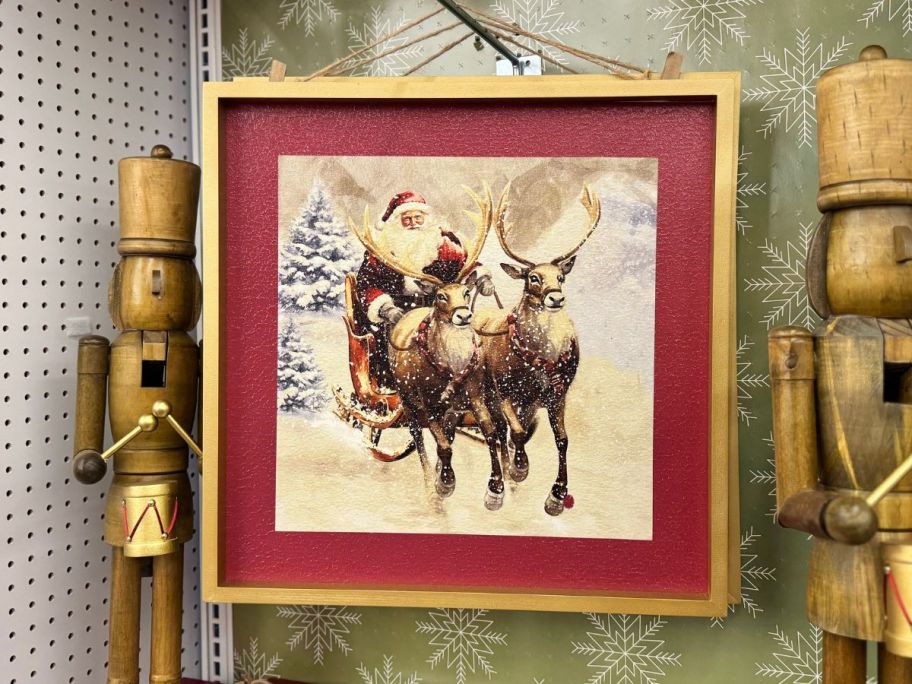 Snowy Santa & Sleigh Wall D&eacute;cor hanging in store