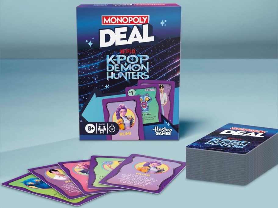 monopoly deal kpop demon hunters card game package and contents displayed