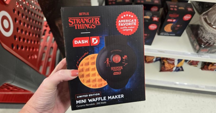 hand holding dash mini waffle maker