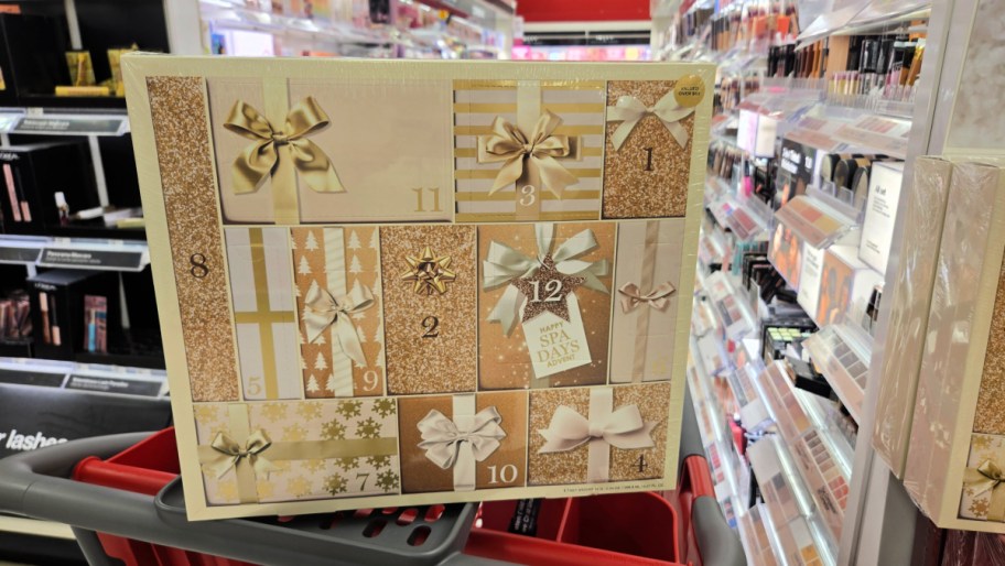 hand holding a happy spa target beauty advent calendar in the store