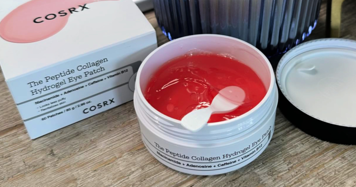 Pink collagen infused eye patches in container on countertop