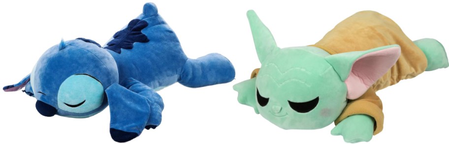 Two plush toys lie side by side: a blue Stitch from "Lilo & Stitch" and a green Baby Yoda. Both are in a relaxed, sleeping pose.