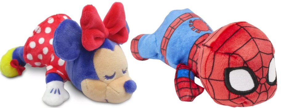 Two plush toys are shown: one resembling Minnie Mouse with purple and red attire, and another resembling a red and blue Spiderman, both lying down.