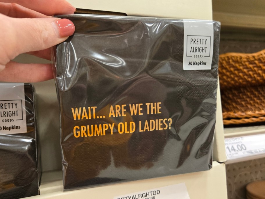 hand holding a pack of napkins that says 'Wait&hellip; Are We The Grumpy Old Ladies?'