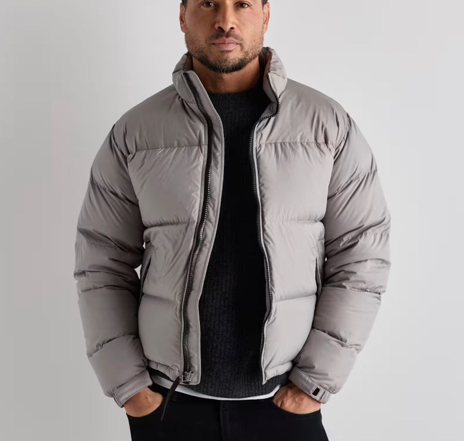 man modeling gray puffer jacket 
