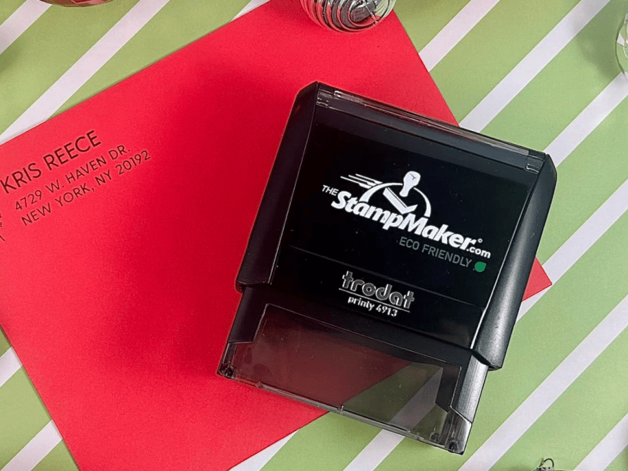 A self-inking stamp on a red envelope