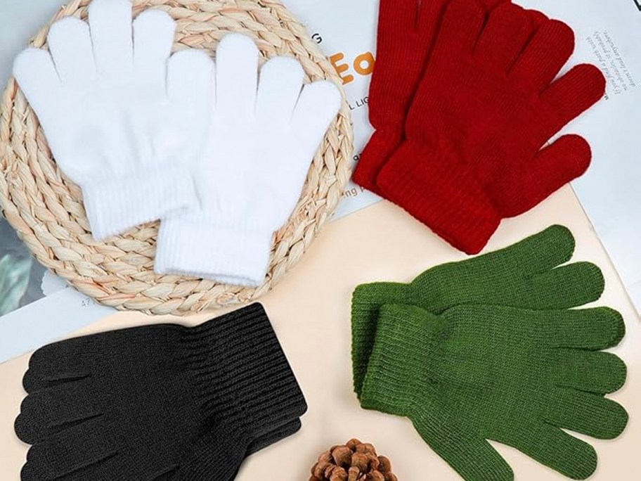 white, red, green and black gloves