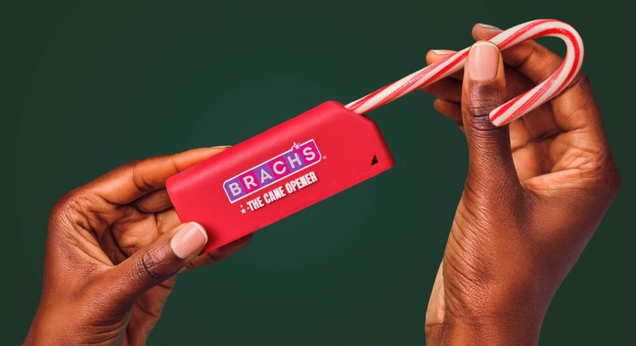 using a red device to open a candy cane