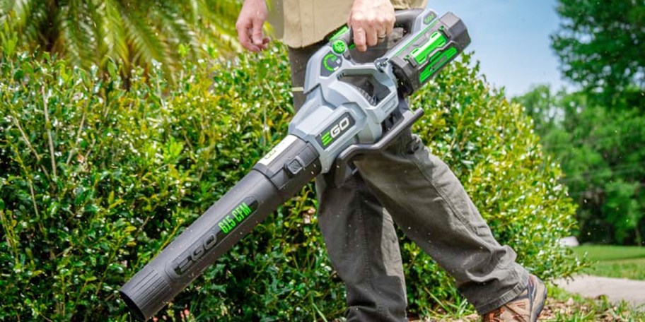 man carrying ego leaf blower