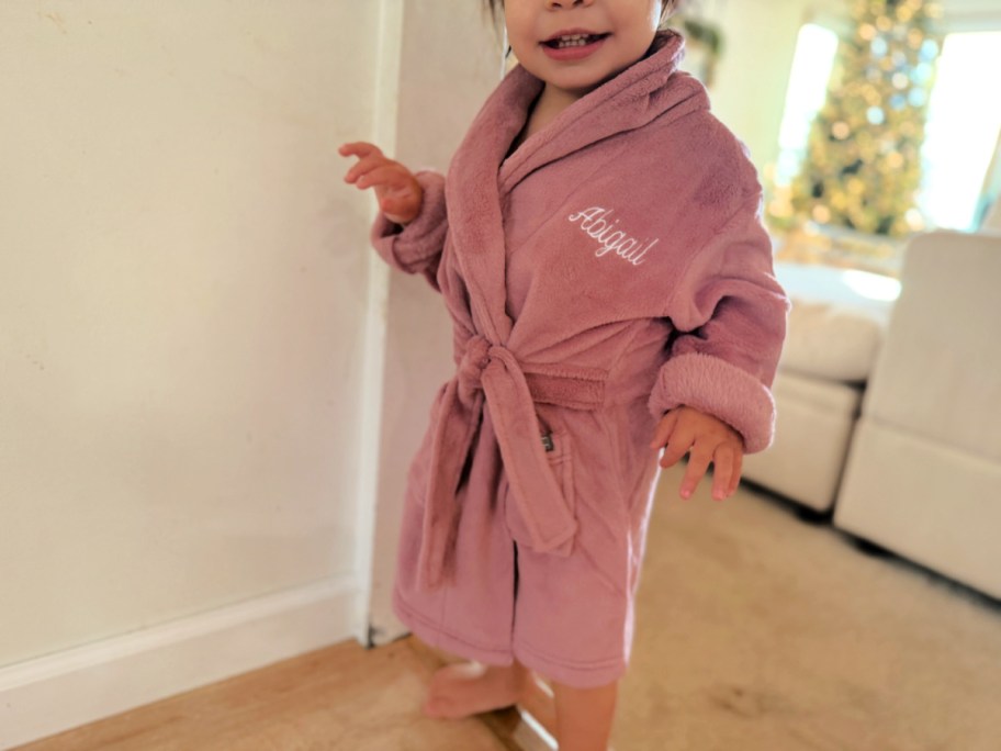 young girl wearing a personalized robe